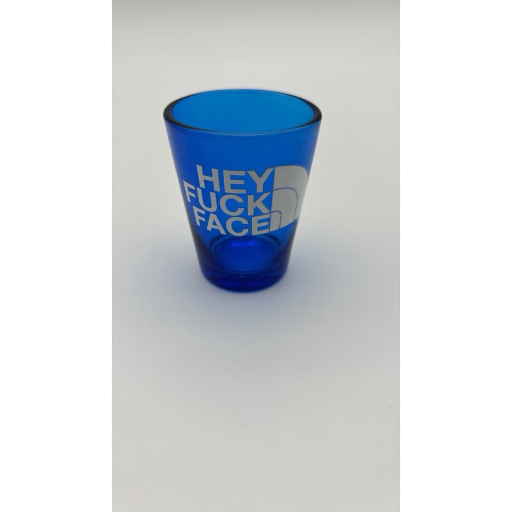 Hey F*** Face Shot Glass. Looks Like North face Logo. VG Condition.